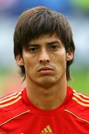 David Silva Long-term Liverpool target David Silva is reportedly being chased by Manchester United with Valencia likely to sell for £25m. - david-silva-face-200