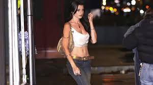 Julia Fox Bares Midriff in Crop Top & Denim Look