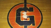 Brothers salvaging Gilbert school gym floor from the wrecking ball