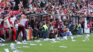 La Liga match abandoned as Rayo Vallecano fans throw paper planes onto pitch