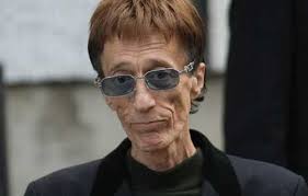 Robin Gibb has told doctors that he &quot;wants to live no matter what.&quot; The Bee Gees&#39; star has colon and liver cancer, and doctors feared that he could die ... - robin-gibb-new2-big