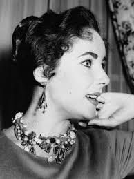 ELIZABETH TAYLOR&#39;S JEWELLERY collection fetched a record-setting $115 million (â¬88.6m) â including more than $11.8 million for a pearl necklace and more ... - PA-11625022-310x415