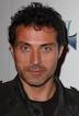 Rufus Sewell (Adam)