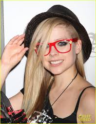 About this photo set: Avril Lavigne shows off her Abbey Dawn swag at the clothing line&#39;s booth for the 2012 Magic Convention held at the Las Vegas ... - avril-lavigne-abbey-dawn-las-vegas-03