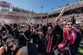 Stanford graduates urged to be optimistic, seek justice in clashing ceremonies
