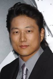 Sung Kang is a Korean American actor who played President Gin Kew Yun Chun Yew Nee in Attitudes and Feelings, Both Desirable and Sometimes Secretive. - Sung_Kang