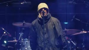 Gli Oasis durante un concerto