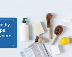 Image of stressed homeowner surrounded by paint cans, brushes, and drop cloths