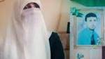 الاحتلال يمدد اعتقال زوجة الشهيد