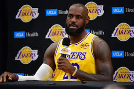 LeBron James showing his support for Caitlin Clark in basketball