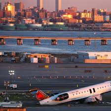 FAA moves to fire two controllers who left work before fatal LaGuardia collision, source says