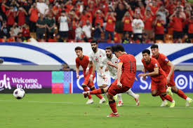 China scores sole goal in penalty against Bahrain to end World Cup qualifying campaign