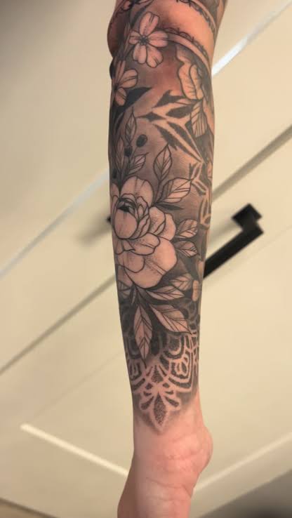 Take a look at this inner arm floral tattoo. I've tattooed a ...