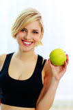 Happy smiling fit woman holding green apple Royalty Free Stock Images - happy-smiling-fit-woman-holding-green-apple-young-36062289