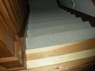 Carpet stairs to wood floor transition