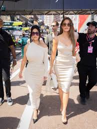 Kim Kardashian Wears Her Backless Bodycon Dress With an Unexpected Accessory