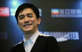 Leung is all smiles at the Singapore press conference for The Grandmaster (ROSLAN RAHMAN / AFP) - 630grandmaster5