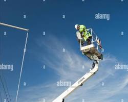 Image of person operating a cherry picker