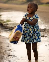 THURSDAY INSPIRATION Her name is Lethukhanya Mjaja. She is three years old. She was sent to buy bread. Her uncle who is a commercial photographer, saw her playing in muddy water with