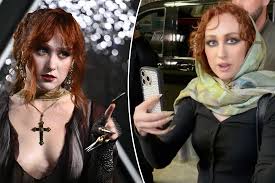 Watch Chappell Roan snap at paparazzi while filming them after they refuse to stop following her