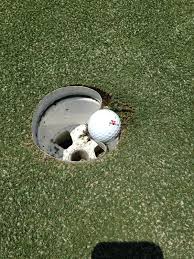 Image result for plugged golf ball on soft green