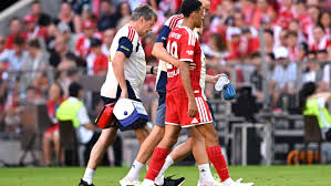 Emergency doctor rushes onto pitch as Jamal Musiala collapses in Bayern Munich's 3-1 win over RB Leipzig; he later walked off unsteady