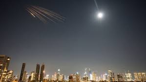 Israeli airstrikes pound Tehran and Beirut as US warns attacks will escalate