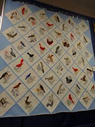 Résultat de recherche d'images pour "hand embroidered quilt with State Birds"
