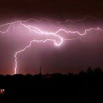 UK hit by 30,000 lightning strikes as storms cause flooding and disruption