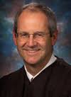 The Hon. William C. Griesbach, Marquette 1979, served as law clerk to the Hon. Bruce F. Beilfuss during the 1979-80 Wisconsin Supreme Court term and as a ... - Griesbach_William
