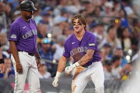 Cole Carrigg triples in Rockies debut and plays with his `hair on fire,’ manager says