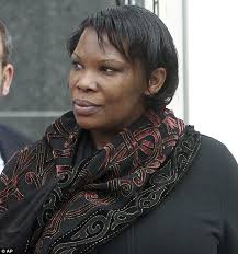 Facing her crimes: Rwanda native Beatrice Munyenyezi, from New Hampshire, remained stoic as U.S. District Judge Steven McAuliffe sentenced her to the ... - article-2364561-1AD46D53000005DC-685_634x679