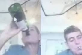 TJ de Minas afasta juiz que tomou vinho da garrafa e acendeu cigarro com maçarico em sessão