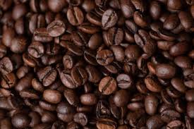 Foto macro de fondo de granos de café tostado | Foto Premium