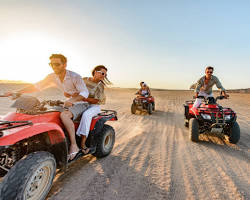 Image of group of friends riding ATVs