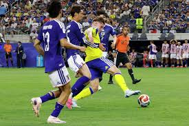 Full coverage: Japan, Sweden play to draw at electric Dallas Stadium