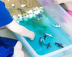 Image of Messy play playing with sand and water