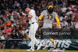 Licensable picture: Detroit Tigers first baseman Spencer Torkelson (20) catches for an out against Athletics center fielder Henry Bolte (33) during