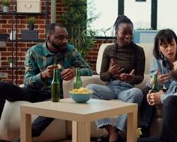 Image of group of friends laughing and talking together