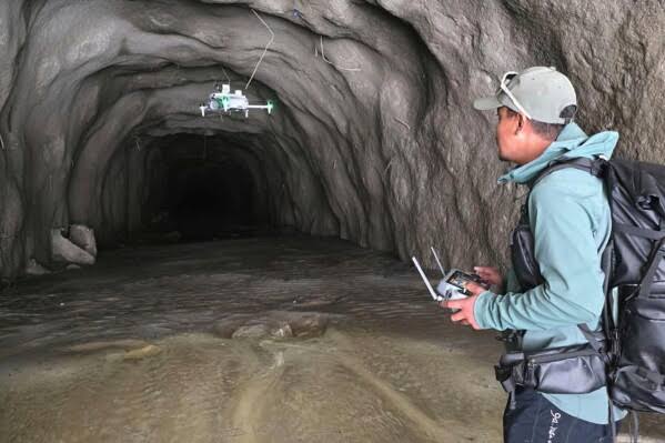 Over 1,000 dead from Nepal-China floods as drones search mud-filled tunnels for 900 missing workers; climate change blamed