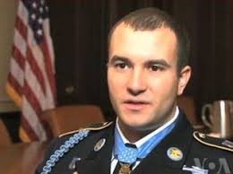 It symbolizes the greatest acts of heroism of the U.S. military. Around the neck of Staff Sergeant Salvatore Giunta, 25, it represents something else. - 6a00e551d9d3fd88330147e0d31d05970b-320wi