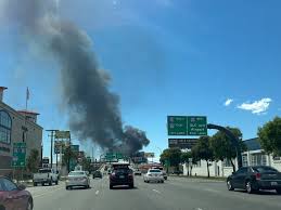 Heavy smoke is visible across Salt Lake, Davis counties after fire ignites on Redwood Road