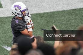 Licensable picture: Brownsburg Bulldogs Jordan Smith (3) smiles with the student section Friday, Sept. 11, 2026, during a game at Brownsburg High