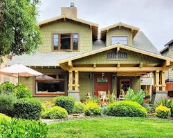 craftsman house exterior olive green paint cream trim red door, AI generated