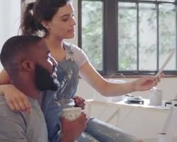 Image of homeowner and painter discussing color samples