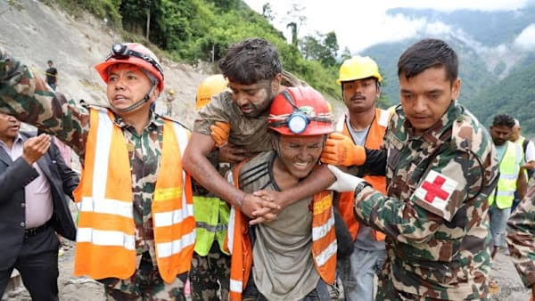 Two hydropower workers survive nine days trapped in a Nepal tunnel after glacier collapse; rescue gives hope for 121 still missing