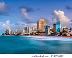 Image of New York City skyline and a beach in Puerto Rico