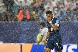 Heavy rain during France vs. Iraq made for incredible World Cup photos