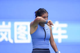 Emma Raducanu at Wuhan Open 2025 amidst challenging conditions