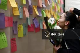 Vigil to commemorate victims of the deadly Wang Fuk Court fire, in London